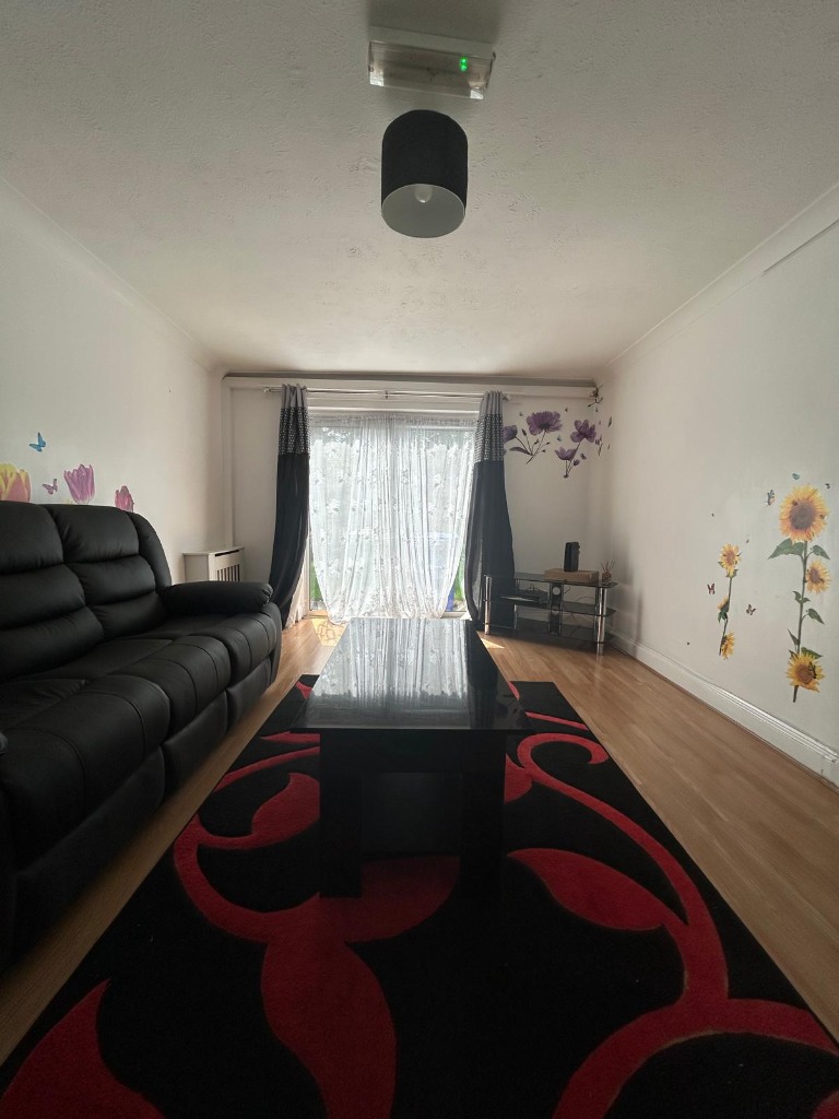 Living room facing patio doors at Bannies Place